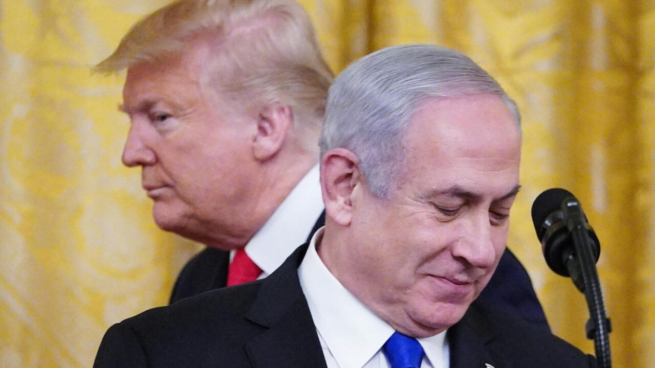 US President Donald Trump and Israel's Prime Minister Benjamin Netanyahu take part in an announcement of Trump's Middle East peace plan in the East Room of the White House in Washington, DC on January 28, 2020. - Trump declared that Israel was taking a "big step towards peace" as he unveiled a plan aimed at solving the Israeli-Palestinian conflict. "Today, Israel takes a big step towards peace," Trump said, standing alongside Netanyahu as he revealed details of the plan already emphatically rejected by the Palestinians. (Photo by MANDEL NGAN / AFP)