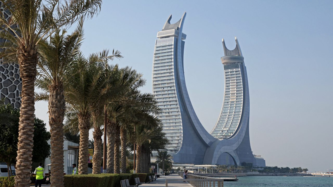 A general view shows the Katara Towers in the Qatari coastal city of Lusail on October 1, 2022, ahead of the Qatar 2022 FIFA World Cup. - Fifty days before the World Cup kicks off in Qatar, workers are pouring concrete and hammering through the night to ready luxury hotels and bargain apartments for a million or more football fans. (Photo by Karim JAAFAR / AFP)