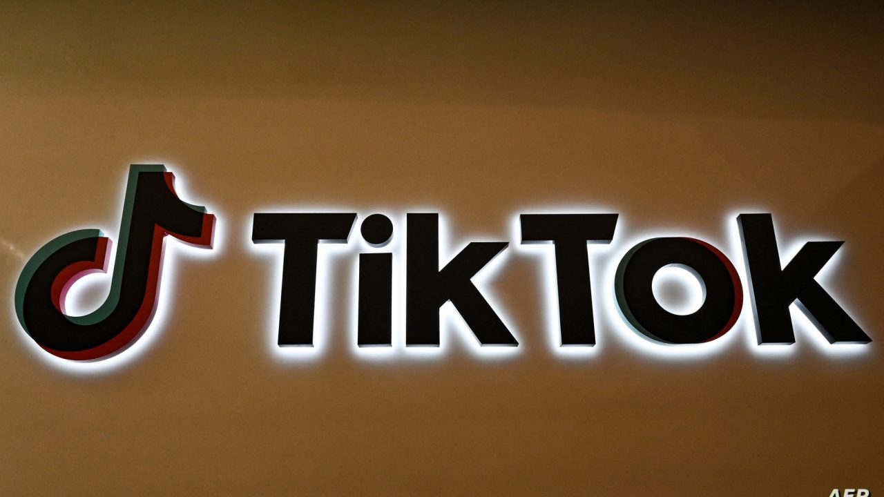 A logo of Tik Tok is seen during a media tour at the company's headquarters in Singapore on September 7, 2023. (Photo by Roslan RAHMAN / AFP)