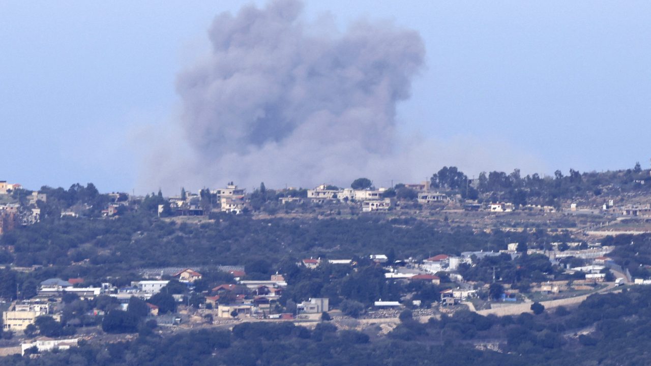 A picture taken from northern Israel on the border with Lebanon shows smoke billowing after an Israeli strike on the southern Lebanese area of Naqura on November 22, 2023, amid increasing cross-border tensions as fighting continues with Hamas militants in the southern Gaza Strip. (Photo by jalaa marey / AFP)