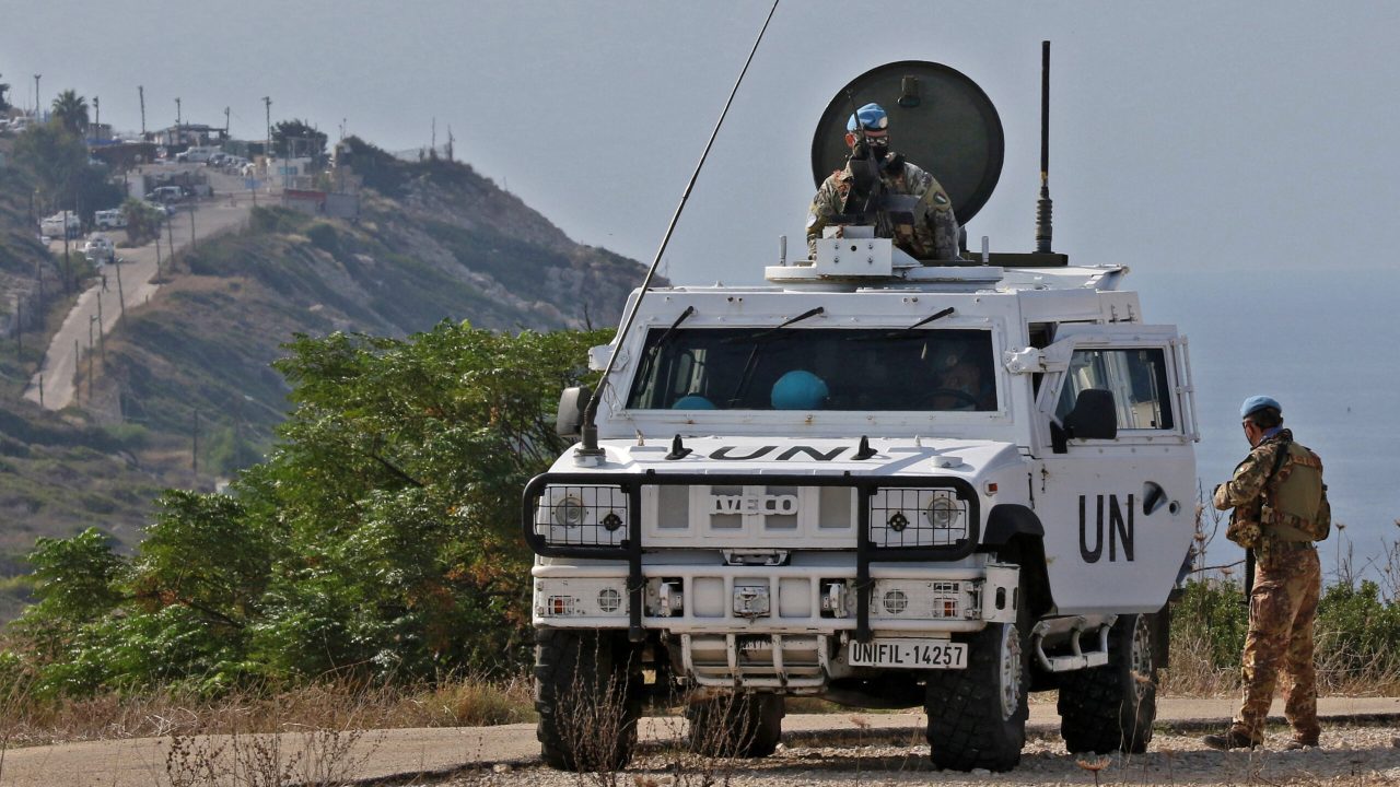 United Nations peacekeeping force in Lebanon (UNIFIL) vehicles patrol the Lebanese southern coastal area of Naqura by the border with Israel, on November 11, 2020. - Lebanon and Israel, still technically at war, held today a third round of maritime border talks under UN and US auspices to allow for offshore energy exploration. The delegations met at a base of the UN peacekeeping force UNIFIL in the Lebanese border town of Naqura. (Photo by Mahmoud ZAYYAT / AFP)