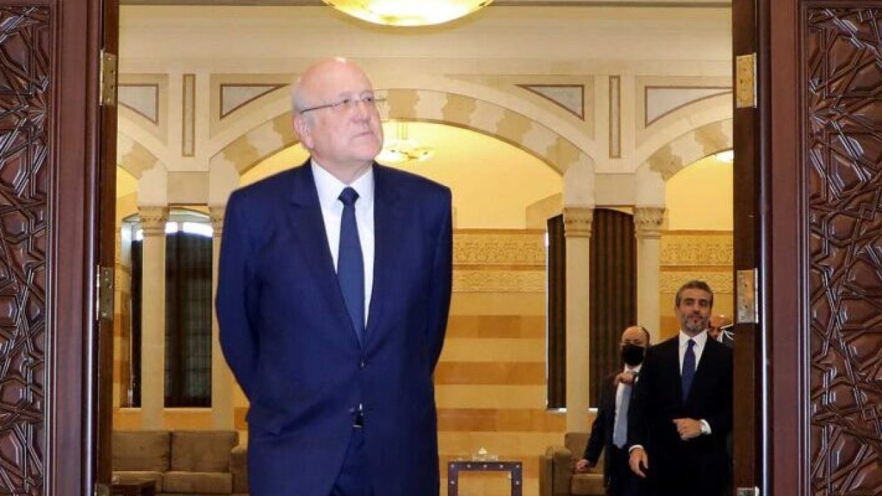 A handout picture provided by the Lebanese photo agency Dalati and Nohra on September 13, 2021 shows Lebanon's Prime Minister-designate Najib Mikati arriving at the Grand Serial (Government Palace) in the capital Beirut. - Lebanon's newly-formed government held its first meeting to discuss ways of rescuing the country from one of its worst ever economic crises. (Photo by - / DALATI AND NOHRA / AFP) / === RESTRICTED TO EDITORIAL USE - MANDATORY CREDIT "AFP PHOTO / HO / DALATI AND NOHRA" - NO MARKETING - NO ADVERTISING CAMPAIGNS - DISTRIBUTED AS A SERVICE TO CLIENTS ===