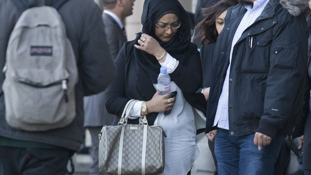 Sahima Begum, older sister of Shamima Begum leaves the House of Commons Home Affairs Committee, after giving evidence on the background and details leading to the disappearance of the three schoolgirls who fled their London homes for the conflict in Syria, in central London on March 10, 2015. AFP PHOTO / JUSTIN TALLIS (Photo by JUSTIN TALLIS / AFP)