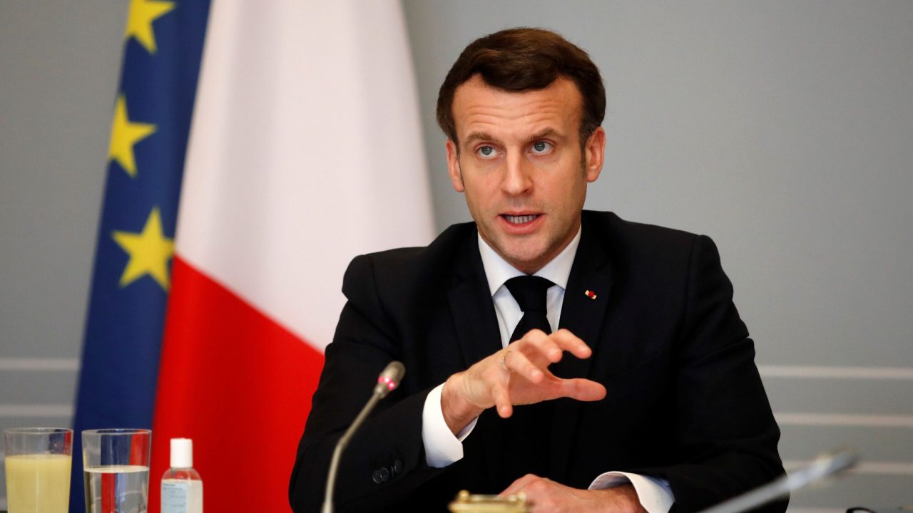 French President Emmanuel Macron gestures as he speaks during a video conference meeting with African Union officials following the ACT-A initiative to coordinate a global and united response to the Covid-19 pandemic, at the Elysee Palace in Paris, on February 17, 2021. (Photo by GONZALO FUENTES / POOL / AFP) (Photo by GONZALO FUENTES/POOL/AFP via Getty Images)