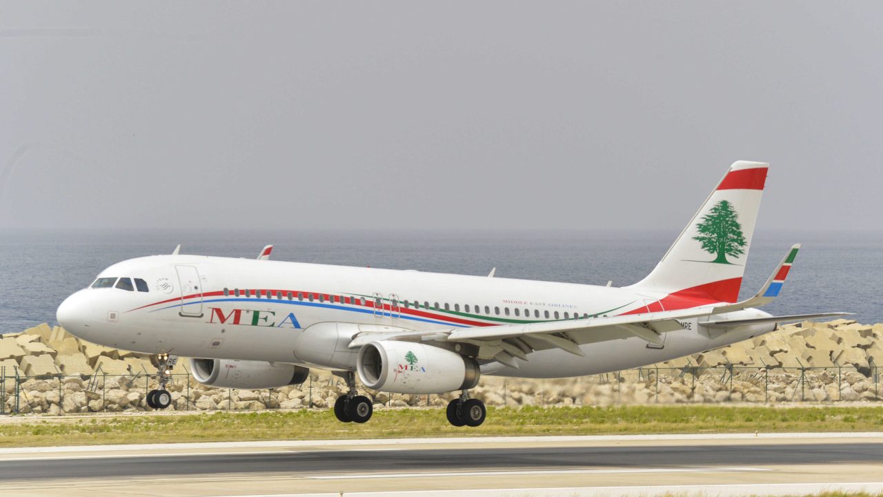 A Middle East Airlines plane, carrying Lebanese nationals residing in Saudi Arabia, lands on the tarmac of Beirut's International airport on April 5, 2020. - Lebanon started repatriating nationals stranded abroad in its first flight in weeks since it closed its international airport to stem the novel coronavirus. Lebanese returning home must pay for their own ticket and their families are not allowed to meet them at the airport. But critics have complained of steep ticket fares, while a financial crisis has severely restricted transactions from Lebanese bank accounts. Middle East Airlines, the week before, claimed tickets were more expensive -- $650 for an economy class seat from Riyadh and $1,800 for a cheaper fare from Abidjan for example -- because planes would be empty on the way out to evacuations. (Photo by - / AFP)