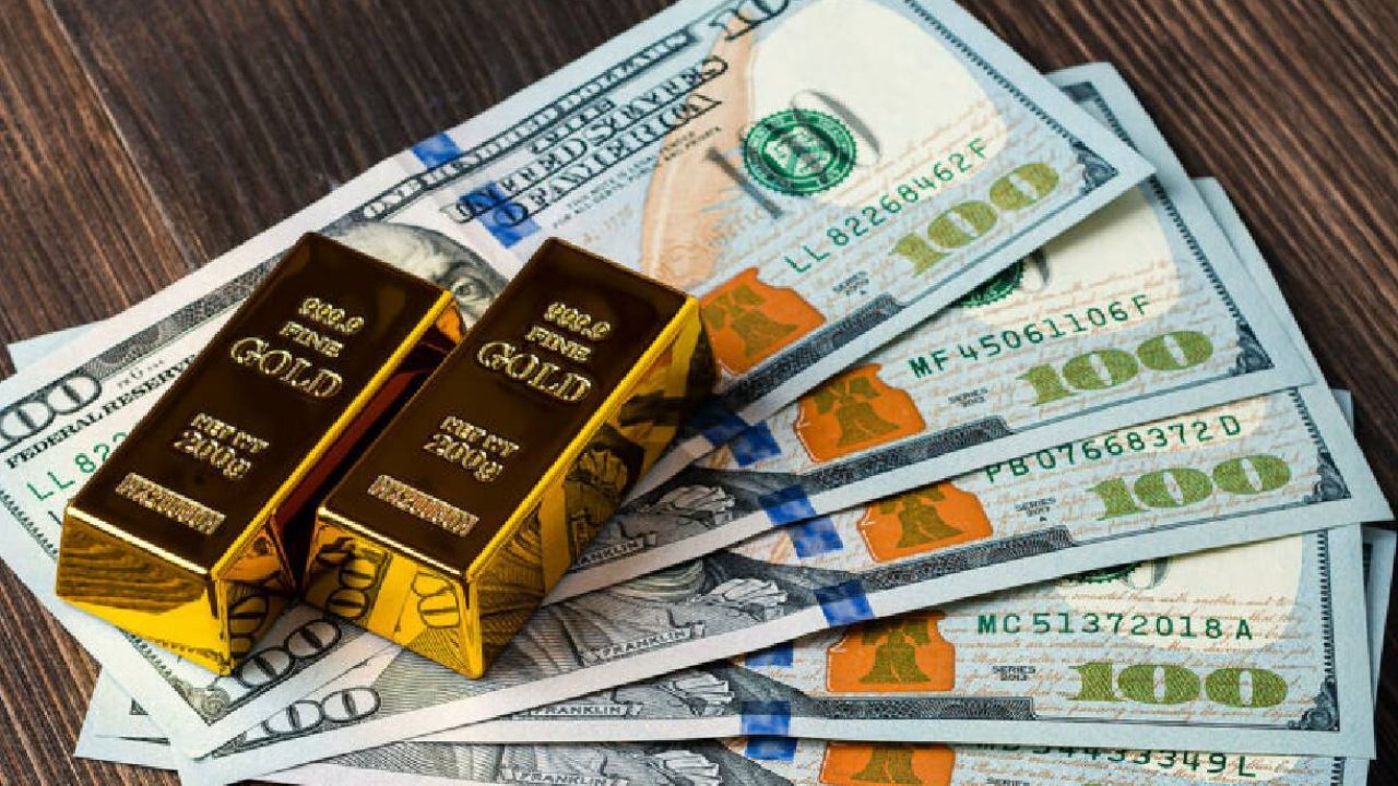 2 gold bars with usd