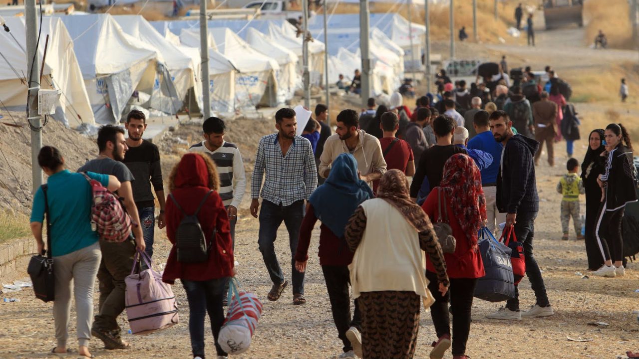 Syrian displaced families, who fled violence after the Turkish offensive in Syria, are seen upon arrival at a refugee camp in Bardarash on the outskirts of Dohuk, Iraq October 25, 2019. REUTERS/Ari Jalal