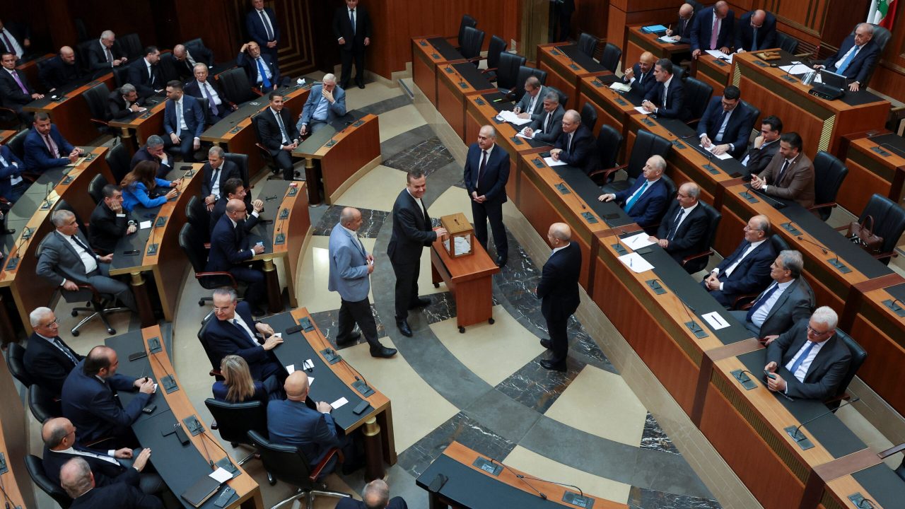 Session to elect a new president at the parliament building in Beirut Hezbollah member of the parliament Hassan Fadlallah casts his vote during the first session to elect a new president at the parliament building in Beirut, Lebanon September 29, 2022. REUTERS/Mohamed Azakir