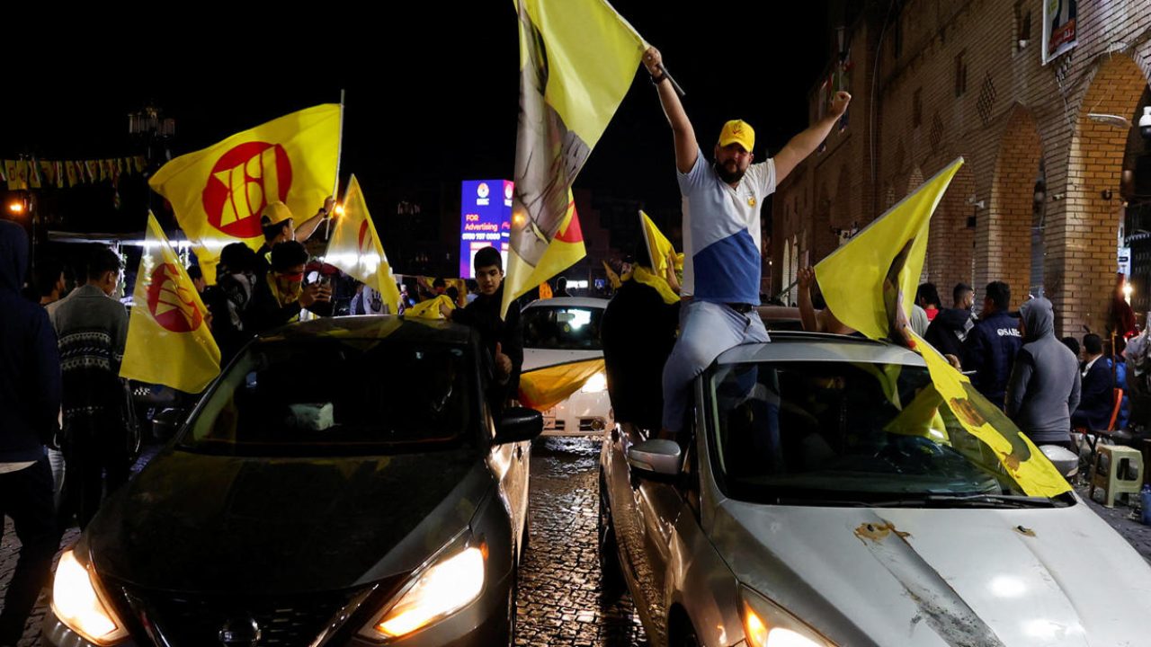 Supporters of the Kurdistan Democratic Party celebrate after voting is closed for the Iraq's Kurdistan region parliamentary election, in Erbil, Iraq October 20, 2024. REUTERS/Khalid Al-Mousily