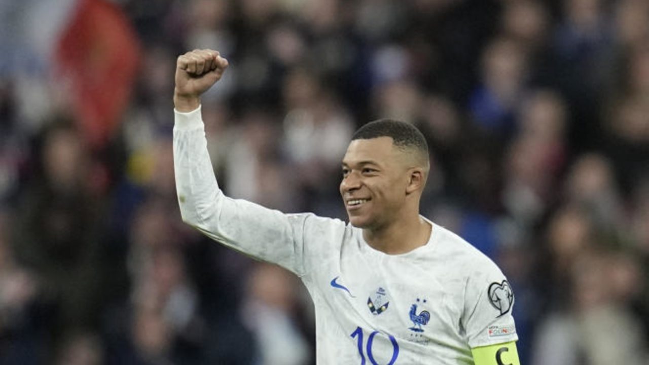 France Netherlands Euro 2024 Soccer France's Kylian Mbappe celebrates after scoring his side's fourth goal during the Euro 2024 group B qualifying soccer match between France and the Netherlands at the Stade de France in Saint Denis, outside Paris, France, Friday, March 24, 2023. (AP Photo/Christophe Ena)