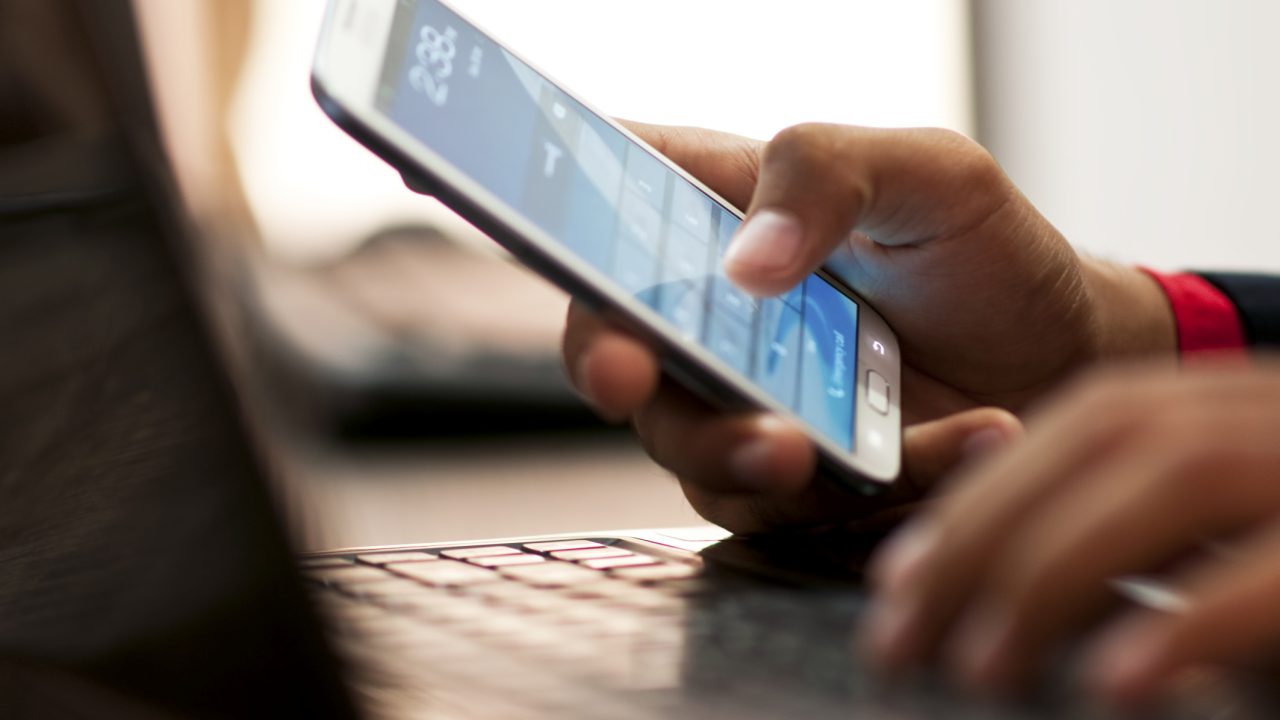 Businessman using smart phone