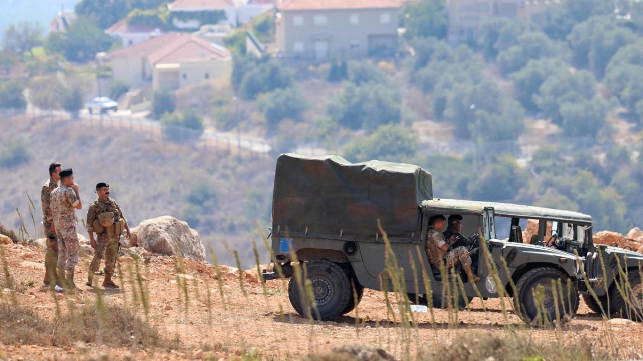 Lebanese army soldiers patrol the border area between Lebanon and Israel on Hamames hill in the Khiyam area of southern Lebanon, on October 13, 2023. Israel shelled a border region in southern Lebanon, two Lebanese security sources said, after a blast occurred on the border fence, according to the Israeli army. (Photo by Joseph EID / AFP)