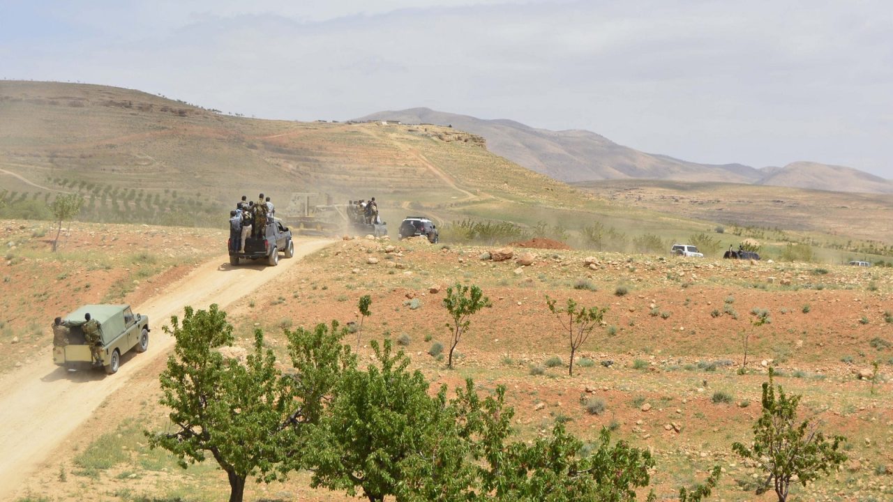 A general view taken on May 9, 2015 shows pro-government forces in Assal al-Ward, a small regime-controlled village situated on the mountain of al-Kanissa in the Qalamun region, as Syrian army troops seized control of several hilltops in the mountainous area that straddles the Syria-Lebanon border with the support of Lebanon's Shiite Hezbollah movement. Pro-government forces have been battling rebel groups and Al-Qaeda affiliate Al-Nusra Front in the Qalamun region, which lies north of Damascus. AFP PHOTO / STR        (Photo credit should read STR/AFP via Getty Images)