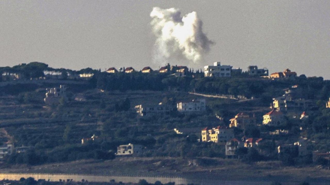 ISRAEL-LEBANON-PALESTINIAN-CONFLICT A picture taken from the Israeli side of the border with Lebanon shows Israeli artillery shelling of the southern Lebanese village of Adaysseh in response to anti-tank fire from Lebanon into northern Israel on December 3, 2023. (Photo by jalaa marey / AFP)