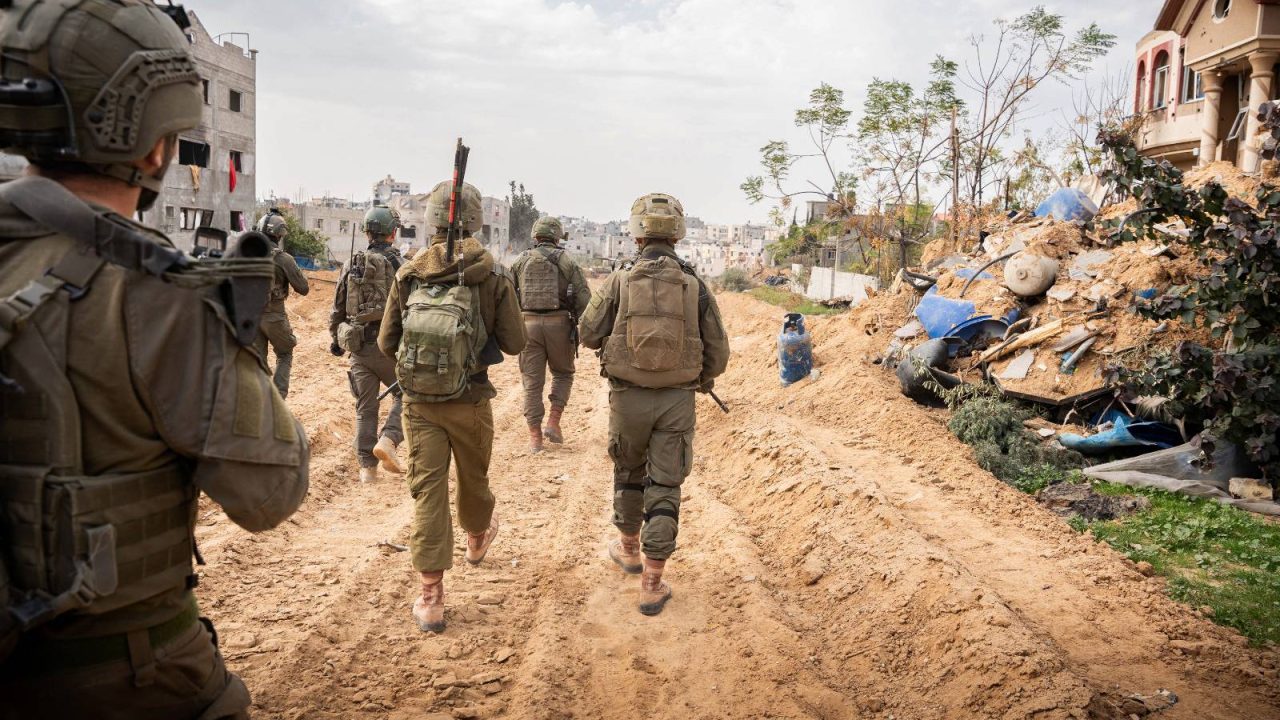 This handout picture released by the Israeli army on December 29, 2023 shows Israeli soldiers operating in the Gaza Strip amid continuing battles between Israel and the Palestinian militant group Hamas. (Photo by Israeli Army / AFP) / === RESTRICTED TO EDITORIAL USE - MANDATORY CREDIT "AFP PHOTO / Handout / Israeli Army' - NO MARKETING NO ADVERTISING CAMPAIGNS - DISTRIBUTED AS A SERVICE TO CLIENTS ==