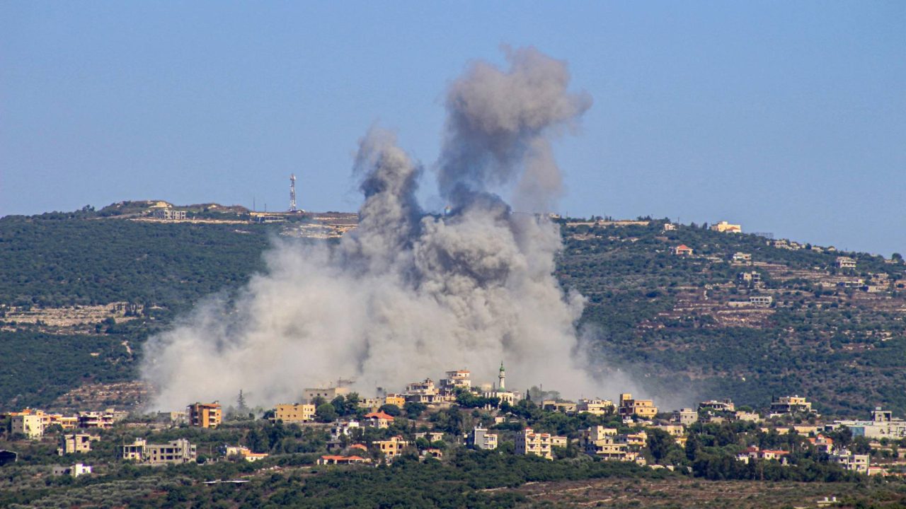 Smoke billows following an Israeli airstrike in the southern Lebanese border village of Chihine on July 28, 2024. Fallout from the Gaza war is regularly felt on the Israel-Lebanon frontier, where deadly cross-border exchanges have escalated between Israeli troops and mainly Hezbollah fighters. (Photo by KAWNAT HAJU / AFP)