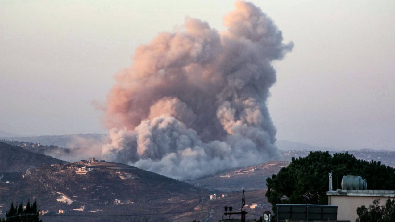 TOPSHOT - Smoke rises over the southern Lebanese village of al-Taybeh  during an Israeli strike on October 26, 2024, amid the ongoing war between Israel and Hezbollah. (Photo by AFP)