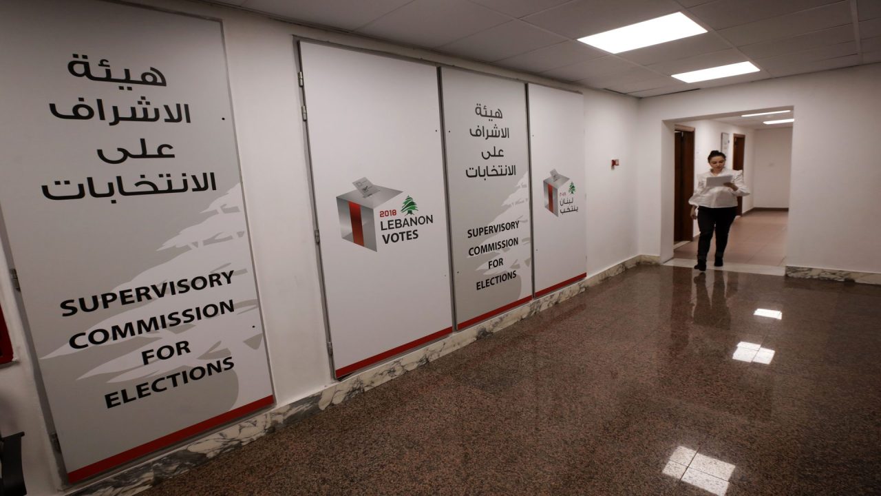 A employee walks at the electoral monitoring committee headquarters in Beirut on April 11, 2018. - In a first, Lebanon's new electoral law has set a spending limit on campaigns and established an electoral commission to monitor media appearances. (Photo by ANWAR AMRO / AFP)        (Photo credit should read ANWAR AMRO/AFP/Getty Images)