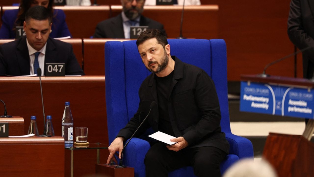 Ukraine's President Volodymyr Zelensky looks on as he addresses members of the Parliamentary Assembly of the Council of Europe following the signing of an agreement for establishing a special tribunal to try top officials responsible for Russia's invasion of Ukraine at the Council of Europe in Strasbourg, eastern France, on June 25, 2025. (Photo by FREDERICK FLORIN / AFP)