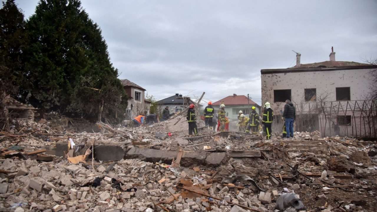 Ukrainian rescuers work among the rubble at the site of an air attack in Lapaivka, Lviv region on October 5, 2025, amid the Russian invasion of Ukraine. (Photo by AFP)