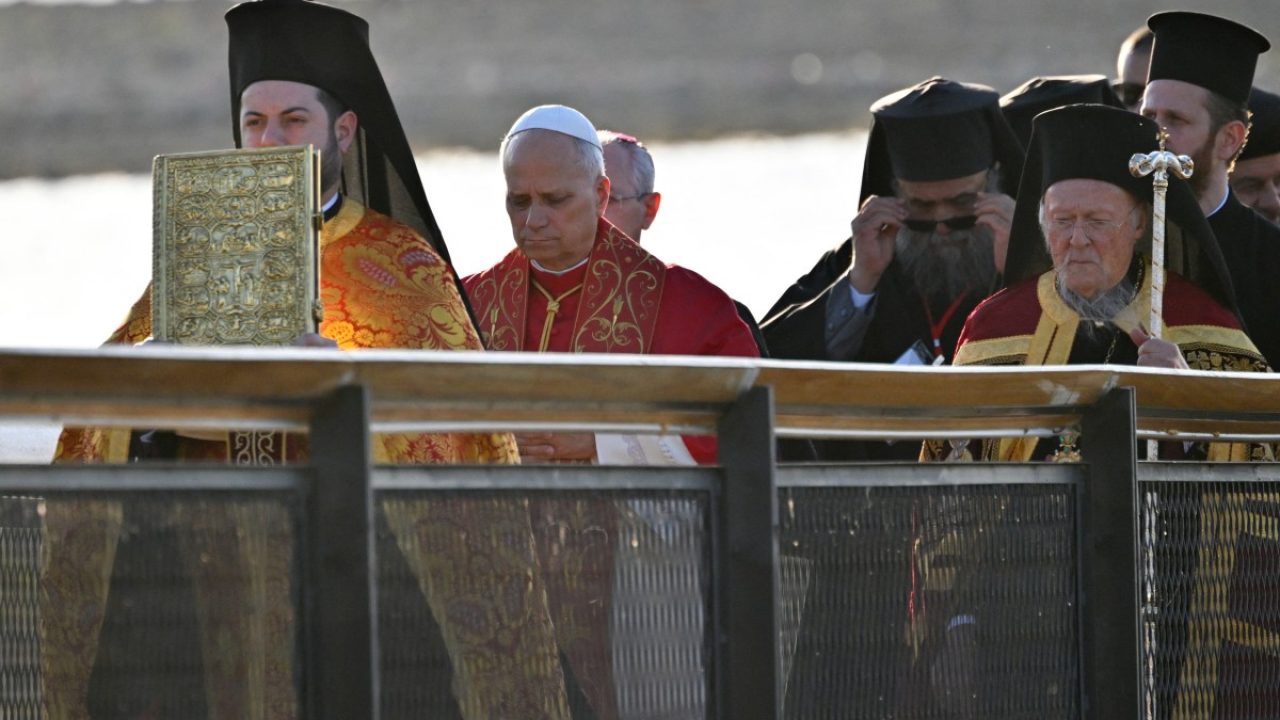 Pope Leo XIV and Patriarch Bartholomew I of Constantinople attend an ecumenical prayer service near the sunken Byzantine Basilica of Saint Neophytos by Lake Iznik, on November 28, 2025. (Photo by Andreas SOLARO / AFP)