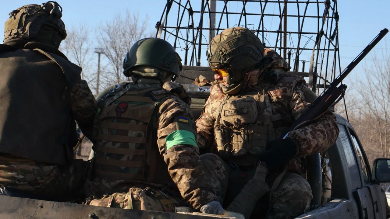 In this handout photograph taken and released by the press service of the 65th Mechanized Brigade of Ukrainian Armed Forces on February 10, 2026, Ukrainian servicemen ride a military pickup to the frontline position at an undisclosed location in Zaporizhzhia region, amid the Russian invasion of Ukraine. (Photo by Andriy Andriyenko / 65th Mechanized Brigade of Ukrainian Armed Forces / AFP) / RESTRICTED TO EDITORIAL USE - MANDATORY CREDIT "AFP PHOTO / HANDOUT/ ANDRIY ANDRIYENKO /65TH MECANIZED BRIGADE OF UKRAINE ARMED FORCES" - NO MARKETING NO ADVERTISING CAMPAIGNS - DISTRIBUTED AS A SERVICE TO CLIENTS
