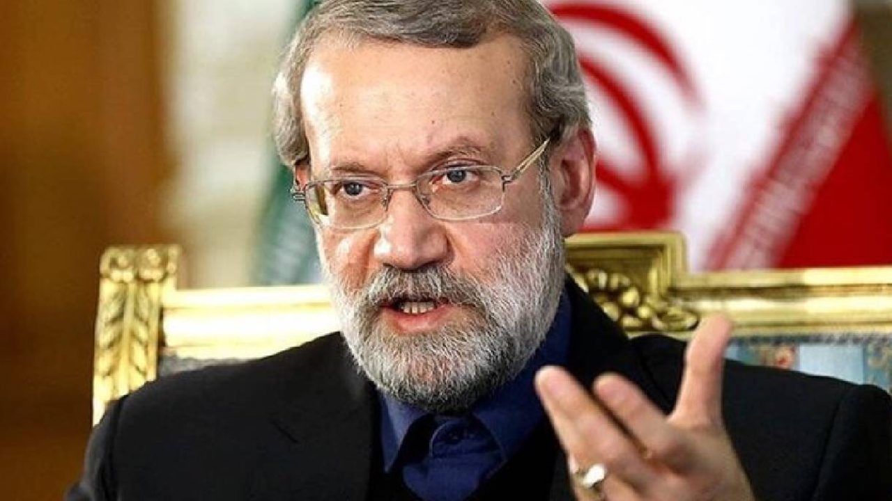 Ali larigani with iranian flag