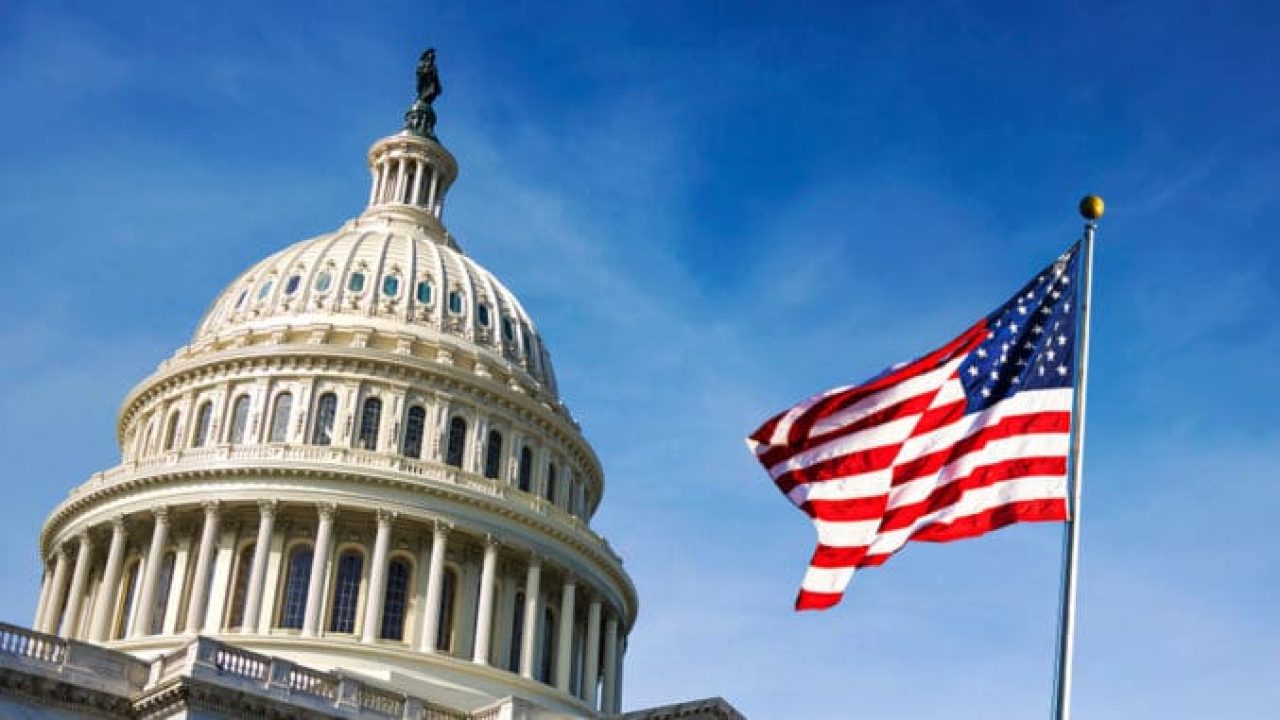 American-flag-waving-with-the-Capitol-Hill-in-the-background-678x381-1