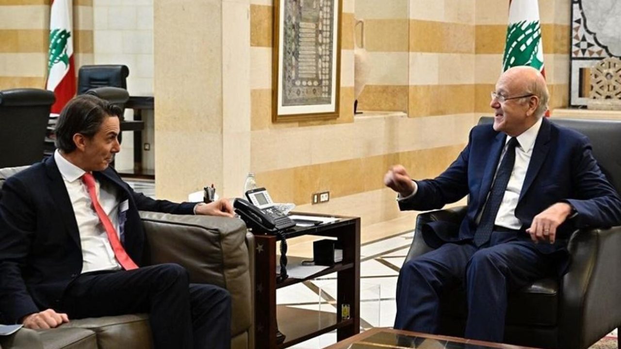 Amous Hokshtayn and Najib Mikaty