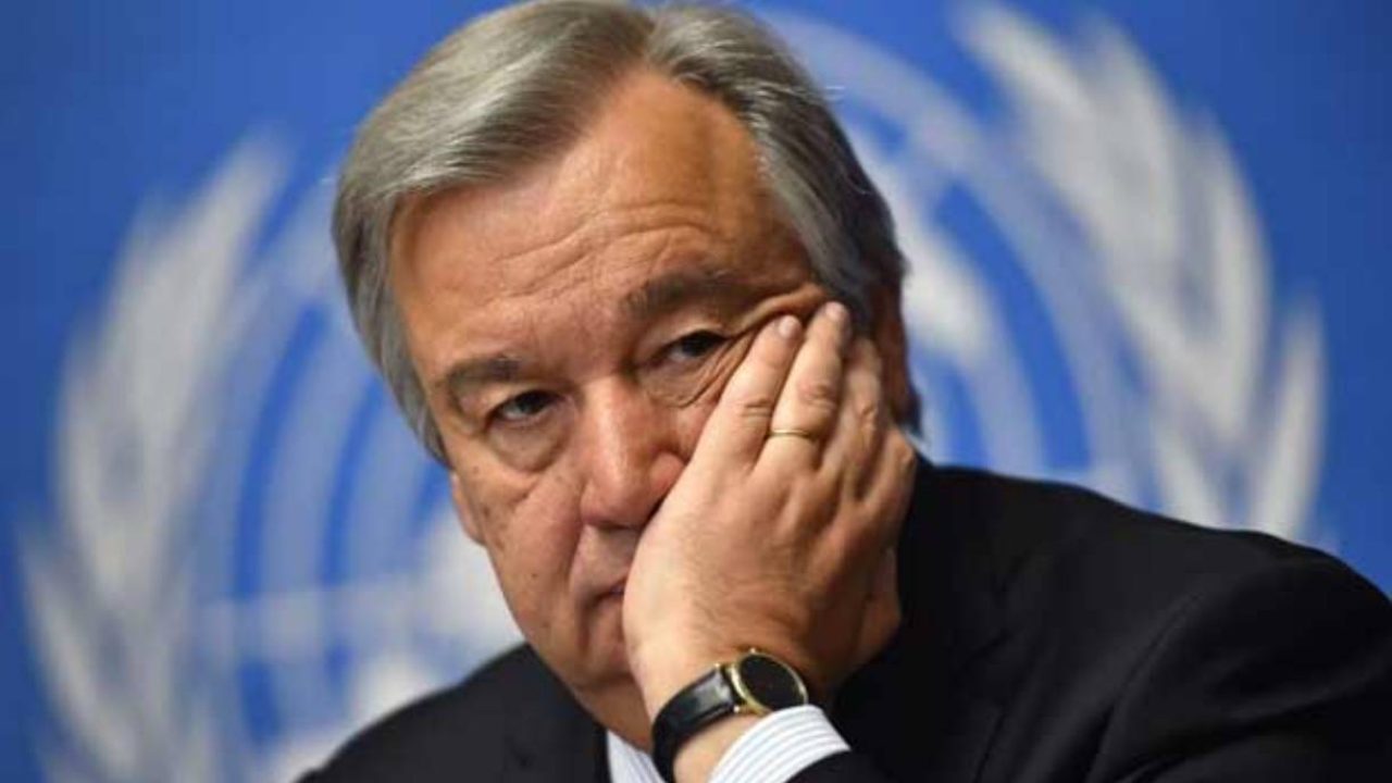 Antonio guterres hand on face