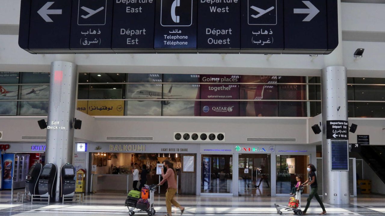 People push trollies, as they head to board a plane at Beirut International airport, Lebanon July 17, 2020. Picture taken July 17, 2020. REUTERS/Aziz Taher