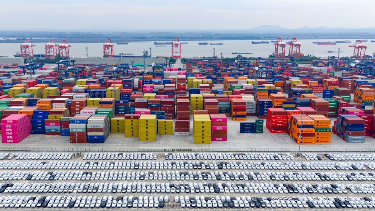 This aerial photo shows cars waiting to be loaded for export in Nanjing port, Nanjing, eastern China's Jiangsu province on November 6, 2025. (Photo by AFP) / China OUT / CHINA OUT