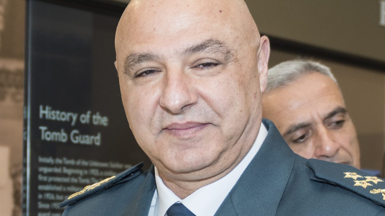 Karen Durham-Aguilera (left), executive director, Army National Military Cemeteries exchanges gifts with Gen. Joseph K. Aoun (second from left), commander, Lebanese Armed Forces in the Memorial Amphitheater Display Room at Arlington National Cemetery, Arlington, Virginia, June 26, 2018. Aoun participated in an Armed Forces Full Honors Wreath-Laying Ceremony at the Tomb of the Unknown Soldier and toured the Memorial Amphitheater Display Room as part of his visit to the cemetery. (U.S. Army photo by Elizabeth Fraser / Arlington National Cemetery / released)