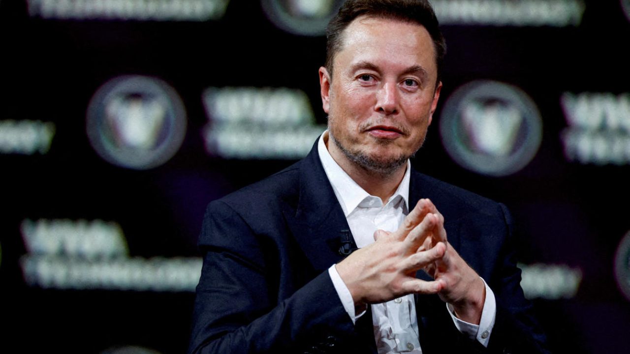 FILE PHOTO: Chief Executive Officer of SpaceX and Tesla and owner of Twitter, gestures as he attends the Viva Technology conference dedicated to innovation and startups at the Porte de Versailles exhibition centre in Paris, France, June 16, 2023. REUTERS/Gonzalo Fuentes/File Photo