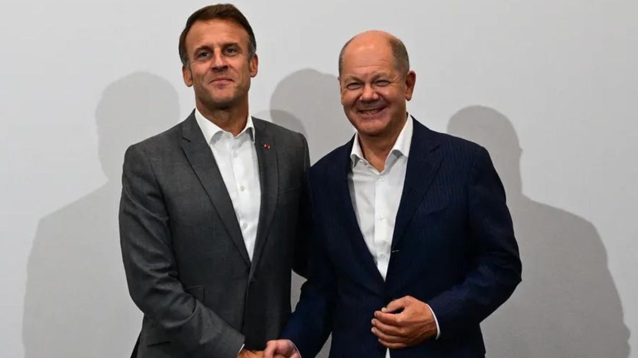 Emmanuel Macron and Olav Sholts