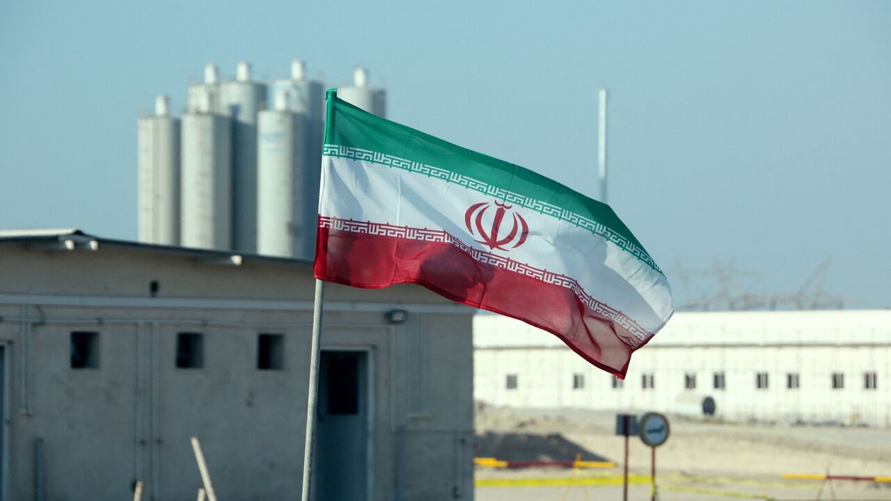 A picture taken on November 10, 2019, shows an Iranian flag in Iran's Bushehr nuclear power plant, during an official ceremony to kick-start works on a second reactor at the facility. - Bushehr is Iran's only nuclear power station and is currently running on imported fuel from Russia that is closely monitored by the UN's International Atomic Energy Agency. (Photo by ATTA KENARE / AFP) (Photo by ATTA KENARE/AFP via Getty Images)