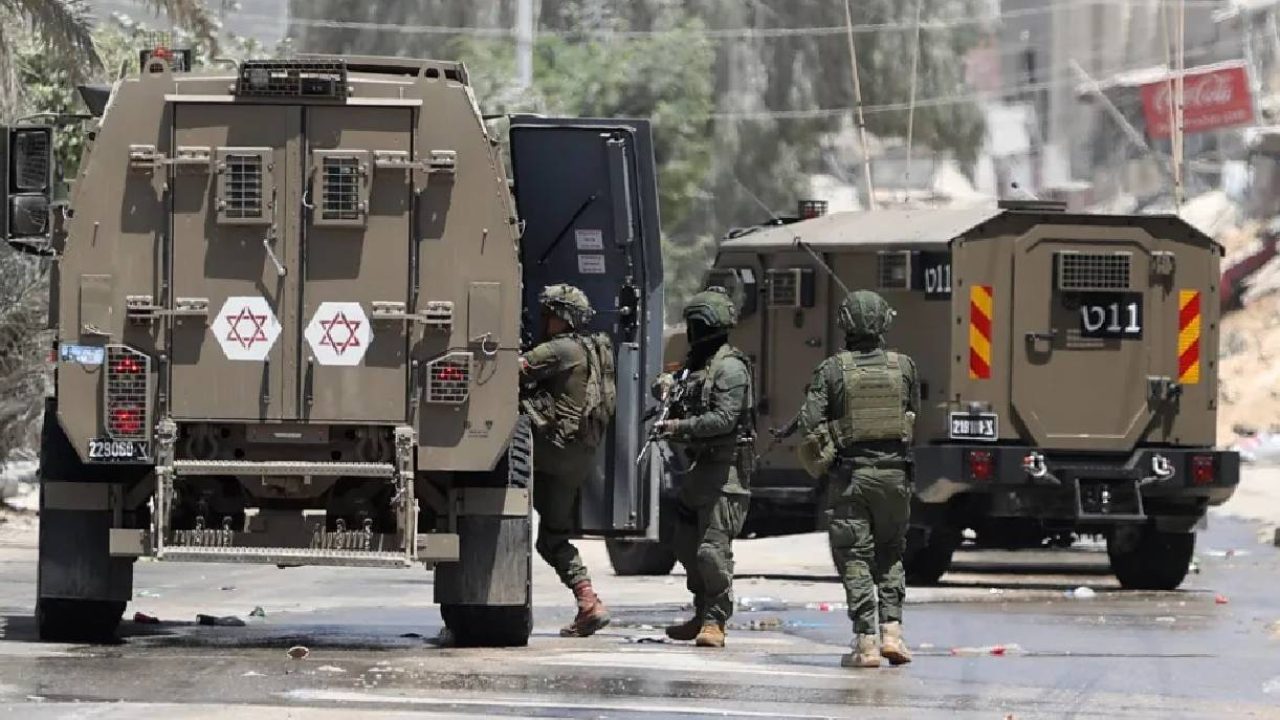 Israeli soldiers in west bank trucks