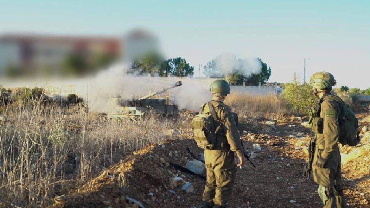 Israeli soldiers with sp artillery