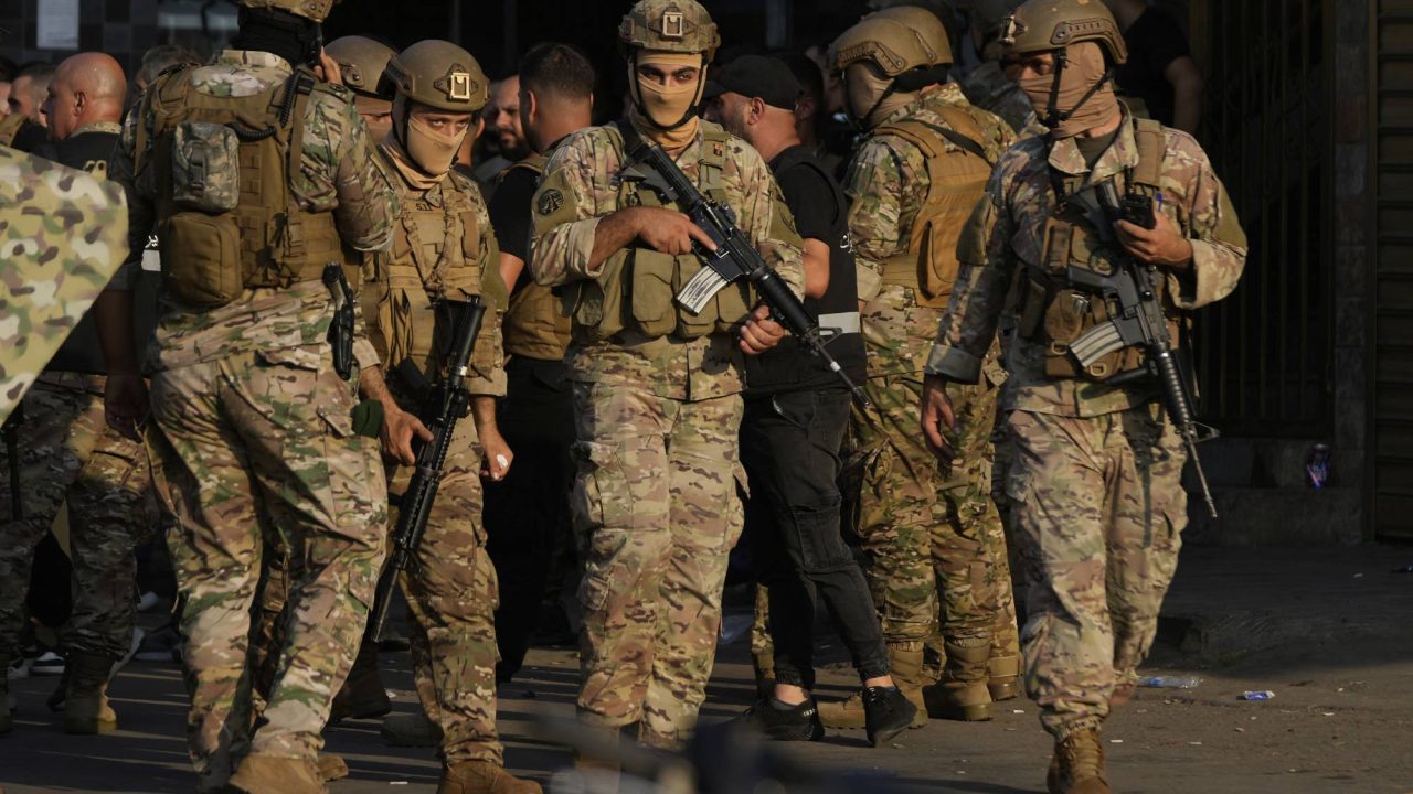 Lebanese soldiers deploy at the entrance of Burj al-Barajneh Palestinian refugee camp where Palestinian factions handed over weapons to the Lebanese army, in Beirut, Thursday, Aug. 21, 2025. (AP Photo/Hussein Malla)