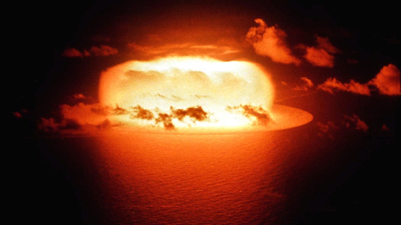 FILE PHOTO 05MAY56 -  The light from an atomic bomb test  explosion (Operation Redwing, Shot Erie) is reflected in the waters of Enewetak Atoll May 30 1956. (Worldwar series