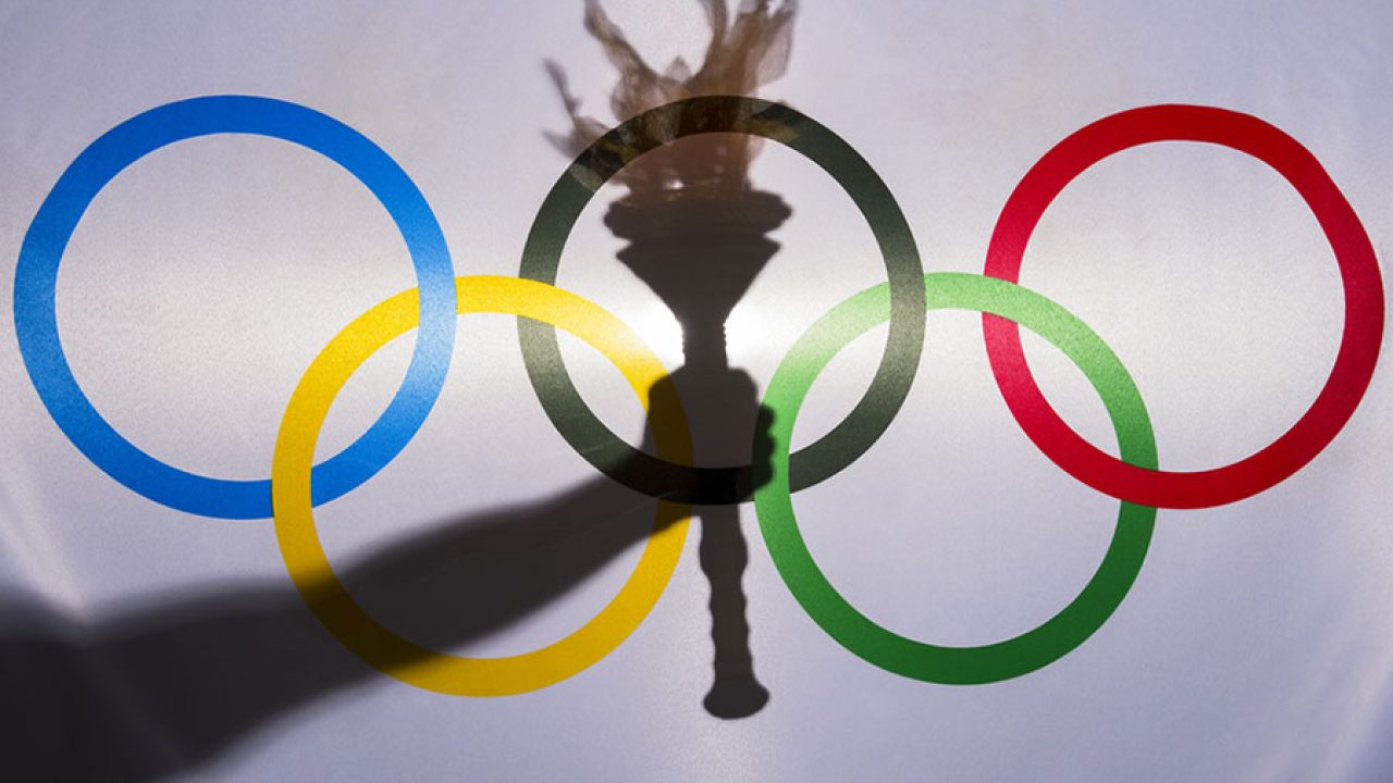 Silhouette-hand-sport-torch-flag-rings-Olympic-February-3-2015