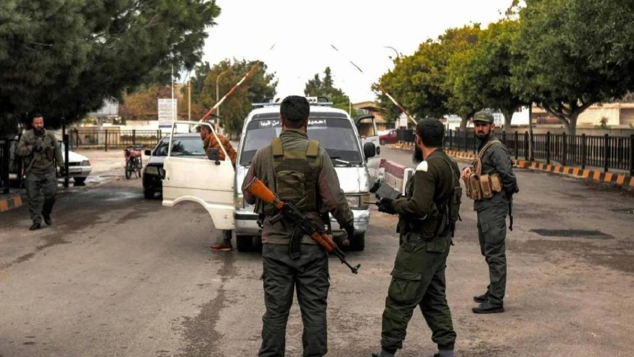 Syrian fighters search van