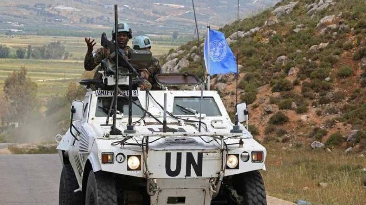 UN soldiers in jeep