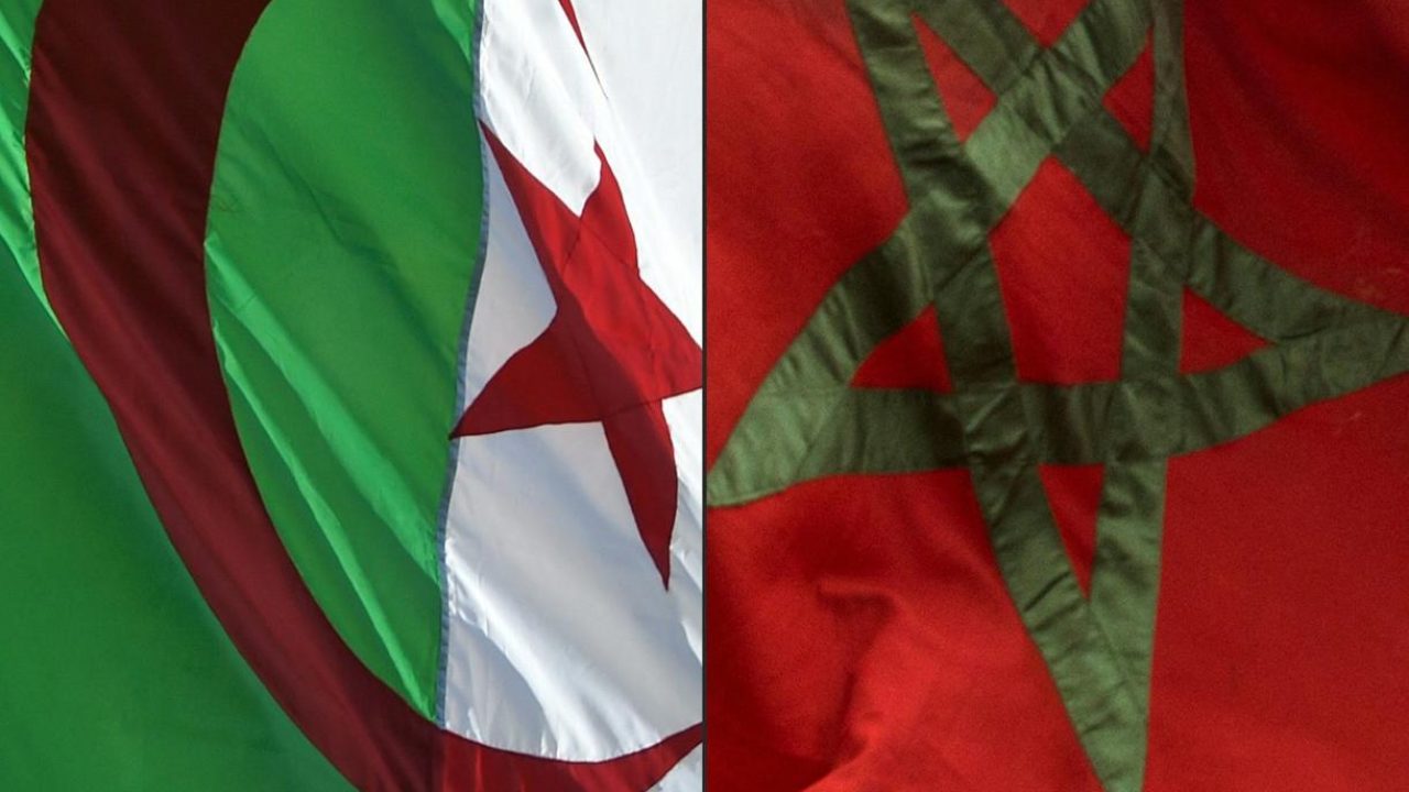 (COMBO) This combination of pictures created on August 27, 2021 shows the national flags of Algeria (L) and Morocco. Morocco is to close its embassy in Algiers today, an official source said, after Algeria severed ties with the kingdom over what it said were "hostile actions". (Photo by RYAD KRAMDI and FADEL SENNA / AFP)