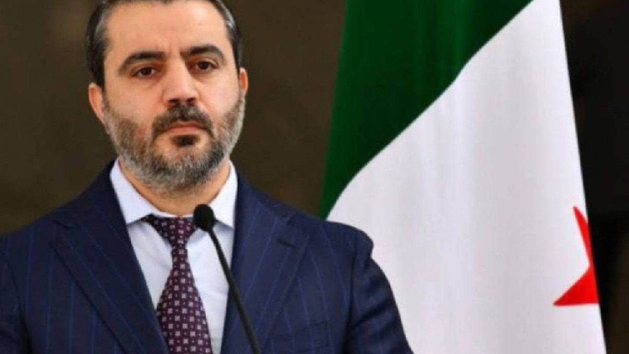 asaad chibani with syrian flag