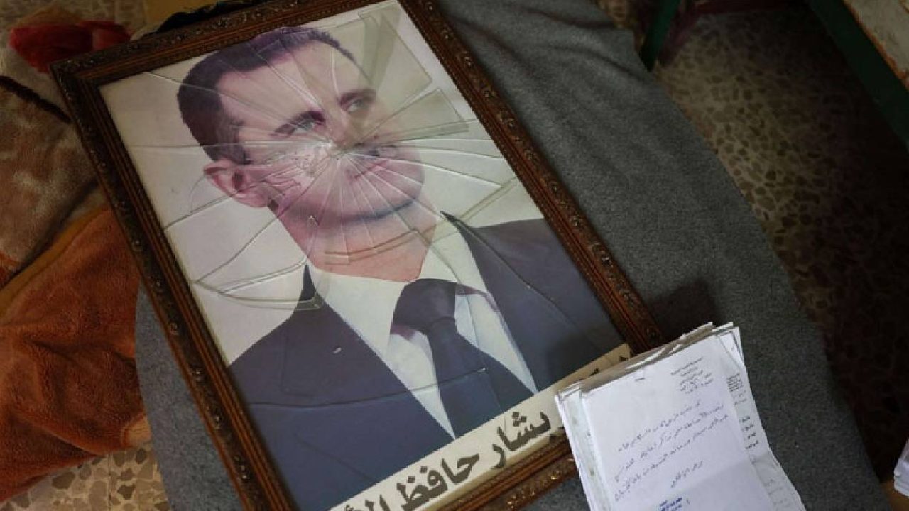assad picture smashed