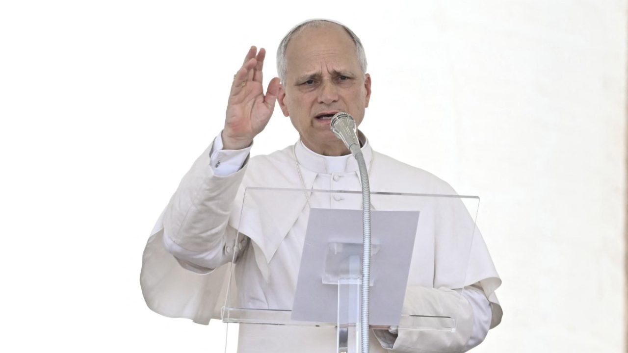 Pope Leo XIV addresses the crowd for the Angelus prayer in The Vatican on June 15, 2025. (Photo by Filippo MONTEFORTE / AFP)