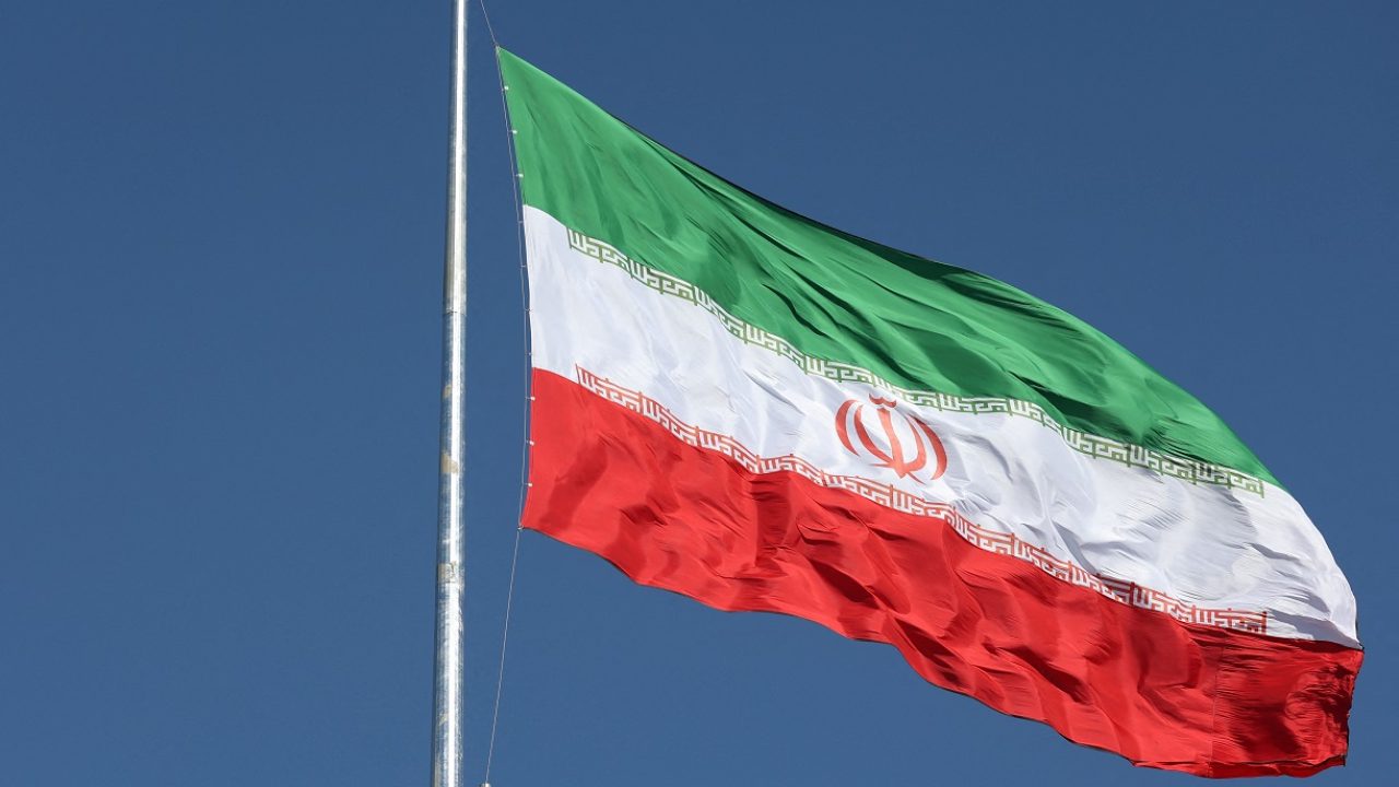FILE PHOTO: The Iranian flag is seen flying over a street in Tehran, Iran, February 3, 2023. Majid Asgaripour/WANA (West Asia News Agency) via REUTERS