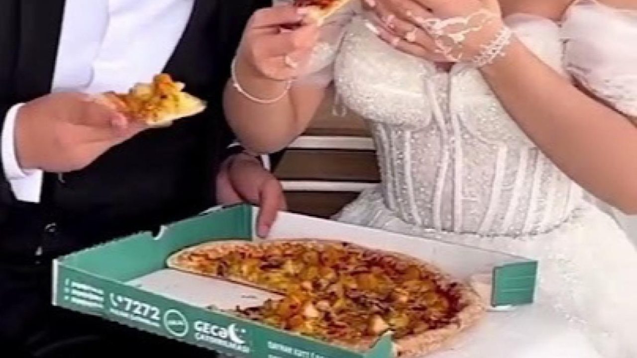 bride eating pizza