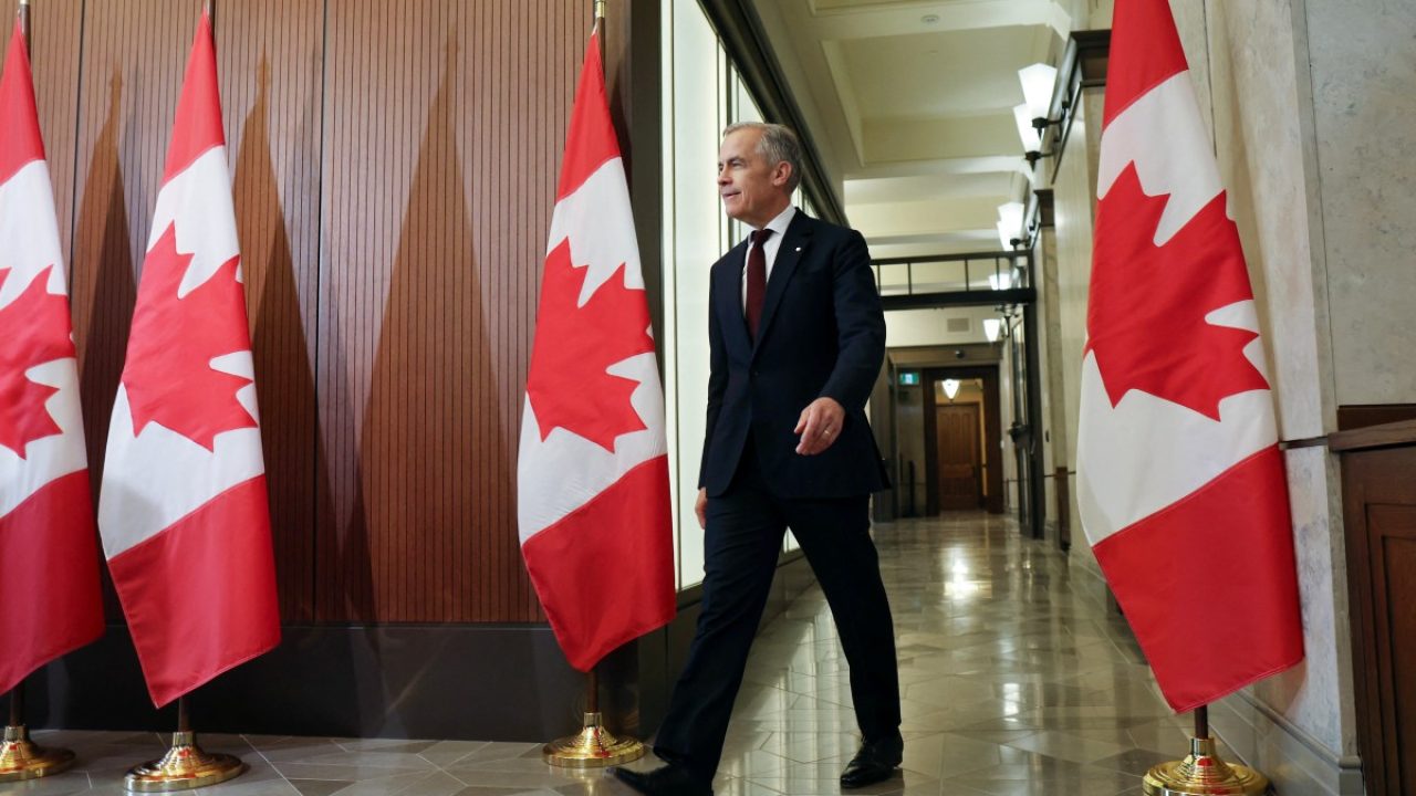 Canadian Prime Minister Mark Carney arrives for a press conference on Parliament Hill in Ottawa on June 6, 2025. (Photo by Dave Chan / AFP)